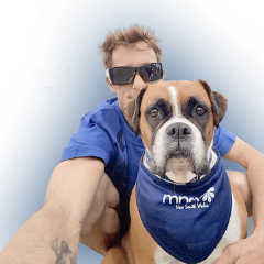 man and boxer dog at mnd nsw walk to dfeet MND